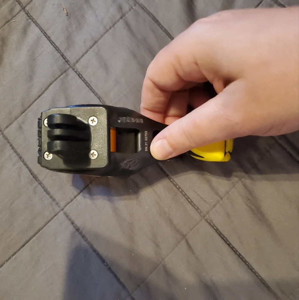 Yellow and Black Camera Tripod Clamp